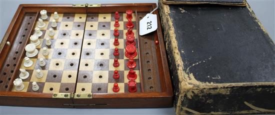A late 19th century Jaques, London Travelling In Statu Quo travelling chess set, the original leather case containing a boxwood